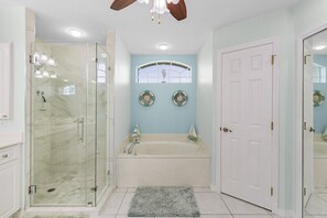 Shower, jetted tub, hair dryer, towels