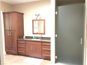 Shower, hair dryer, towels, soap