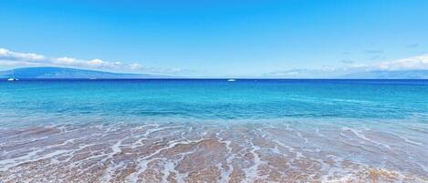 On the beach, sun-loungers, beach towels