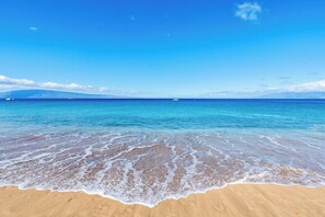 On the beach, sun-loungers, beach towels