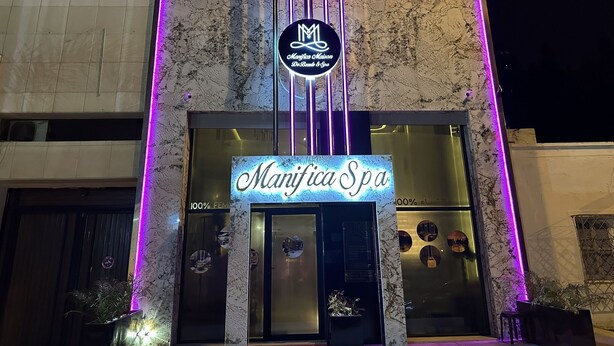 A spa with a neon sign and a marble facade. - Luxury & Clean close to the Sea (Tangier)