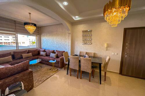 Luxury Apartment | Living area | 65-inch Smart TV with digital channels, Netflix, first-run films