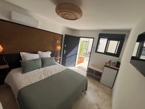 1 slaapkamer, een strijkplank/strijkijzer, wifi, beddengoed