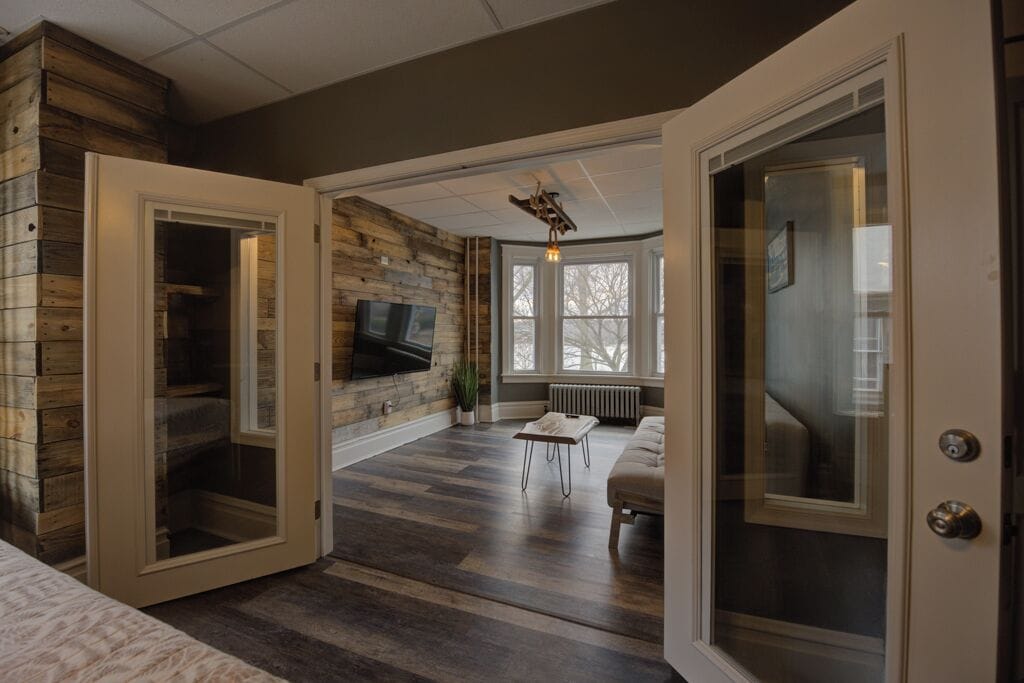 Loft, 2 Bedrooms, River View | Living area | 75-inch Smart TV with digital channels, fireplace, Netflix