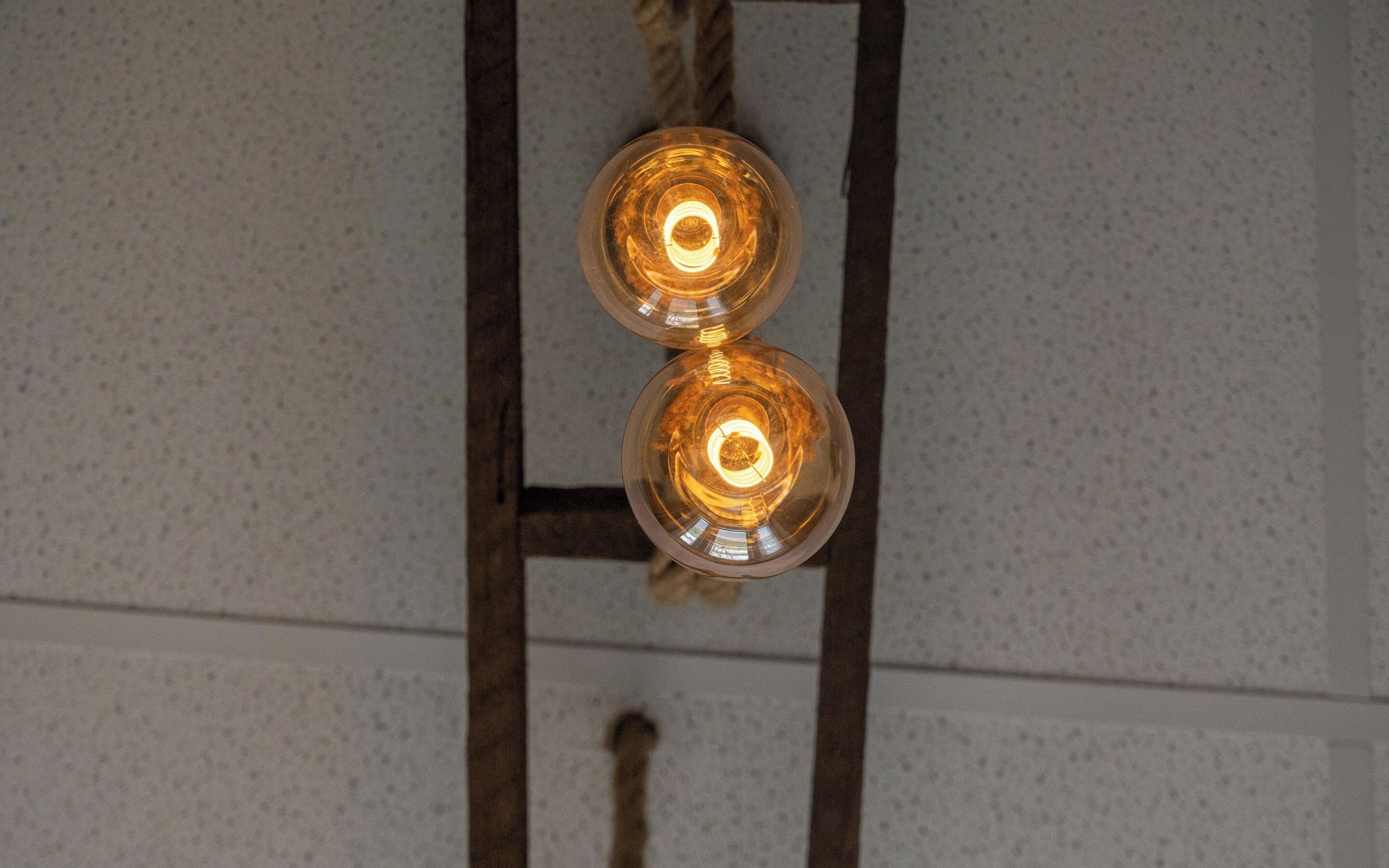 Two hanging light bulbs.