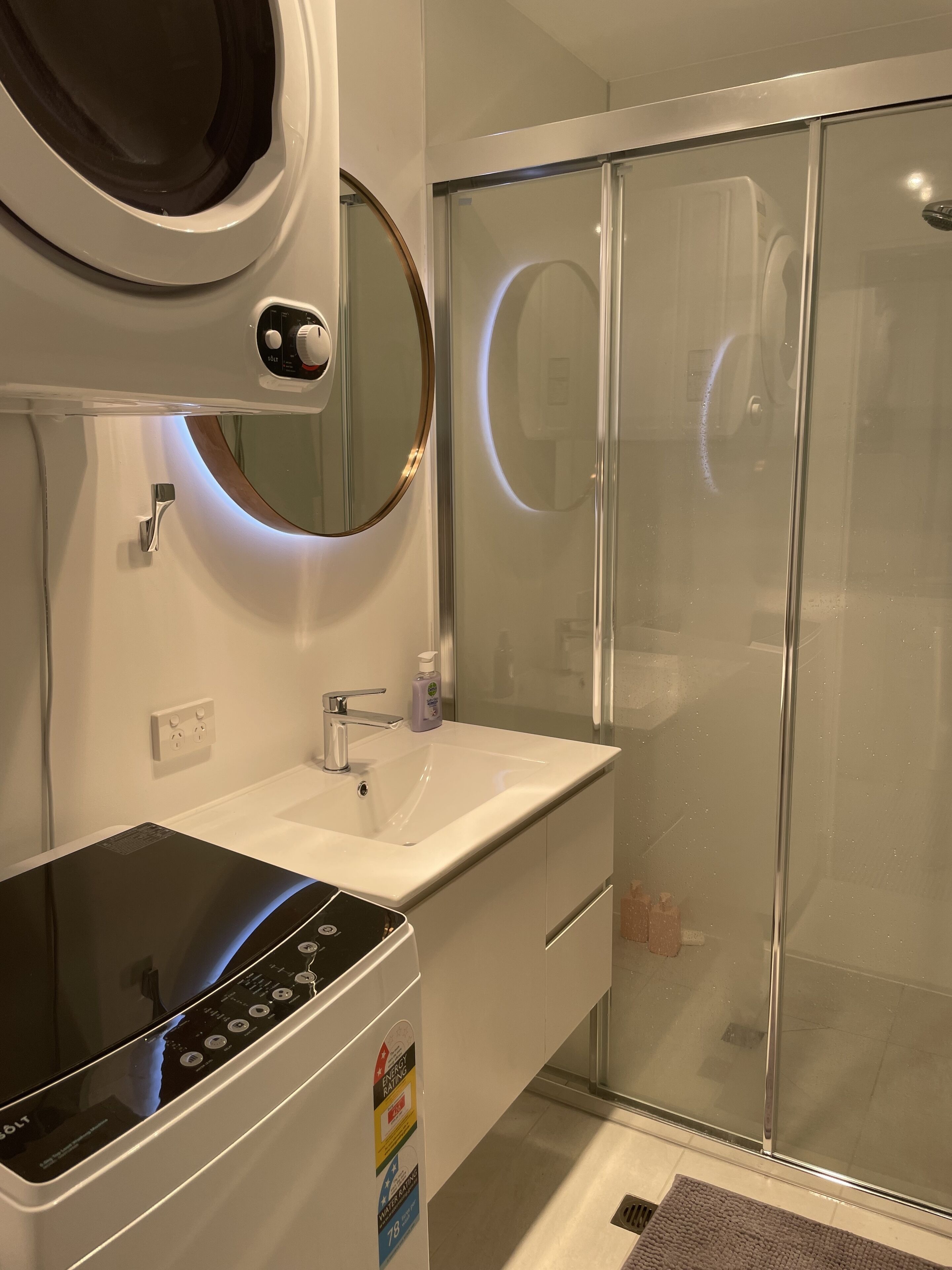 Shower, hair dryer, towels, toilet paper