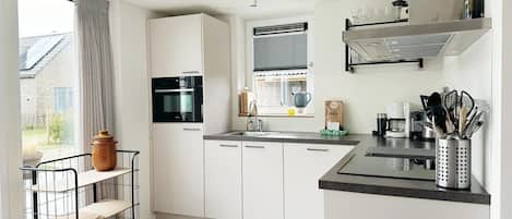 Dishwasher, high chair, dining tables