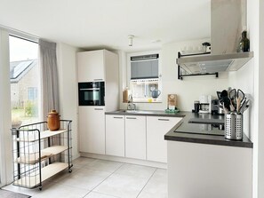 Dishwasher, high chair, dining tables