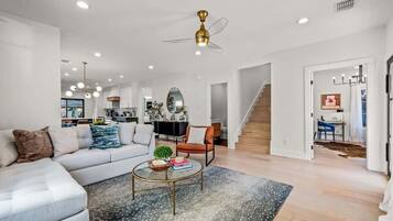 TV, fireplace, books, offices