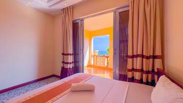 In-room safe, individually decorated, laptop workspace