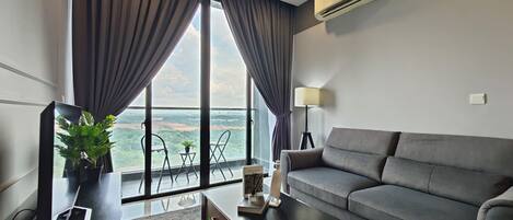 Senior Apartment | Living area | 40-inch Smart TV with digital channels, offices