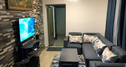 Modern 2 Story Guest House in Kigali with balcony views.