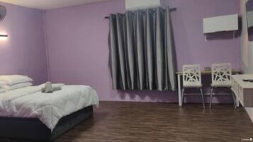 Desk, laptop workspace, blackout curtains, iron/ironing board