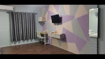 Desk, laptop workspace, blackout curtains, iron/ironing board