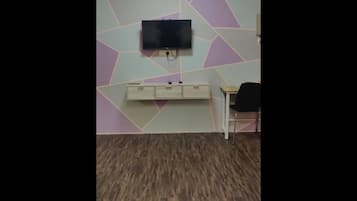 Desk, laptop workspace, blackout curtains, iron/ironing board