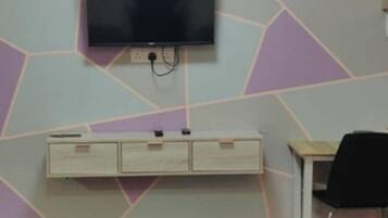 Desk, laptop workspace, blackout drapes, iron/ironing board