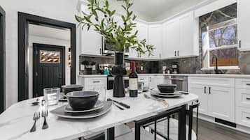 House, Multiple Beds, Hot Tub (212 W Myrtle St.) | Private kitchen | Fridge, microwave, oven, stovetop