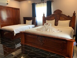 Deluxe Triple Room, Patio, Garden View