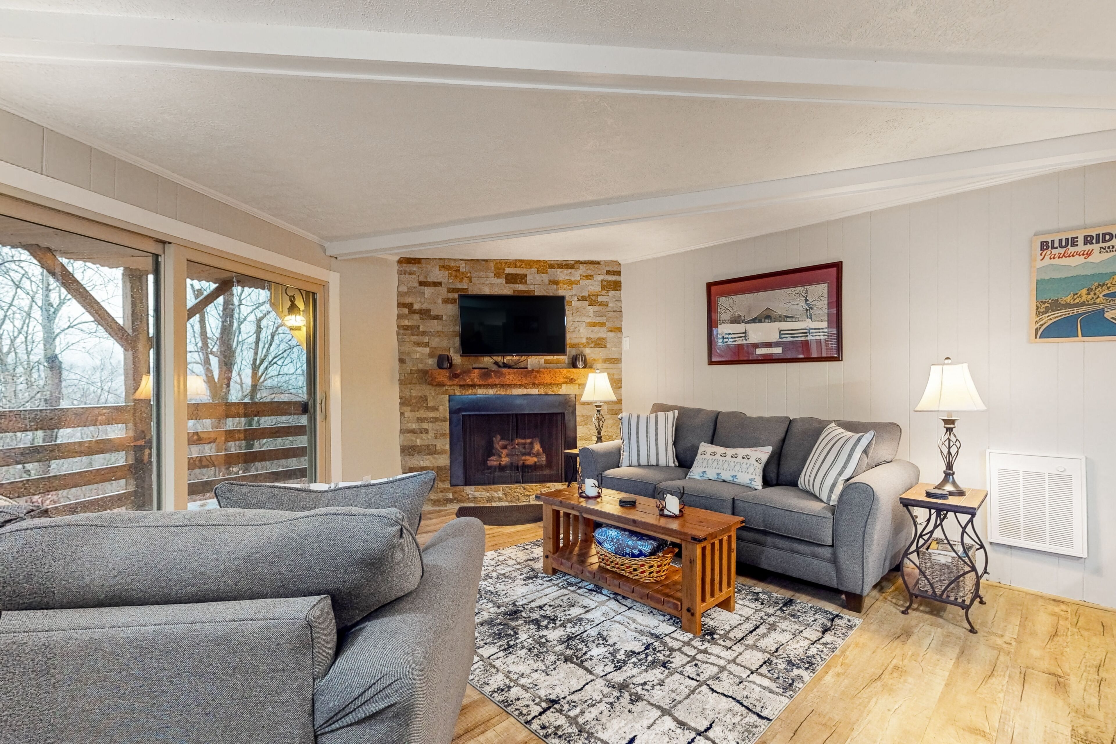 Mountain-view condo with large covered balcony, fireplace, & washer/dryer