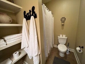 Jetted bath, hair dryer, towels, soap