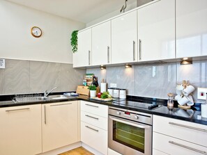 Dishwasher, high chair, cookware/dishes/utensils