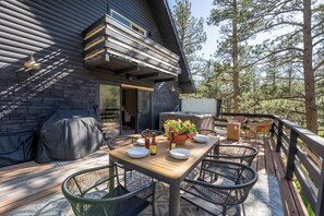 Outdoor dining - Elegant A-Frame w/ Hot Tub Views! Close to town, skiing, & hiking! (Evergreen)