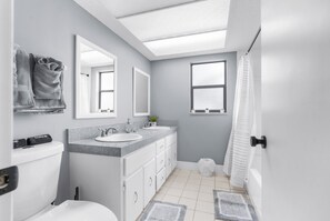 Shower, hair dryer, bidet, towels