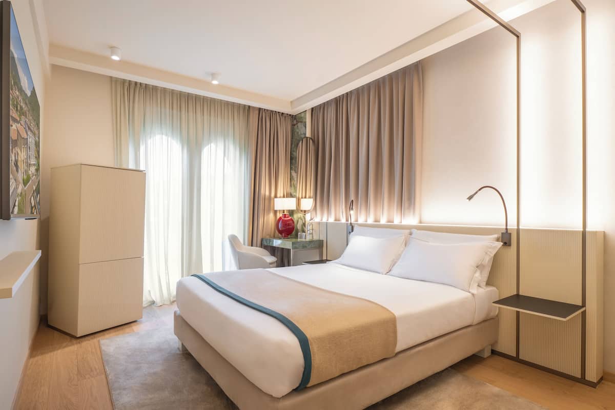 Superior Room | Minibar, in-room safe, individually furnished, desk