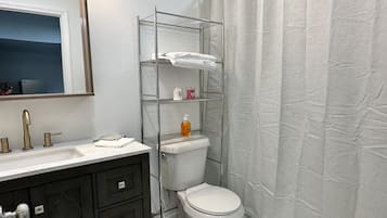 Hair dryer, towels, soap, shampoo
