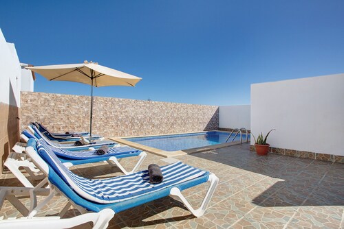 Holiday Apartment 'Casa Tomás B' with Sea View, Shared Pool and Wi-Fi