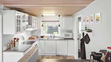 Een koelkast, een kookplaat, een vaatwasser