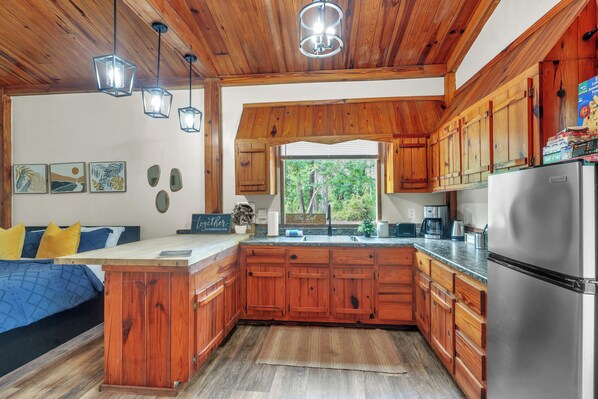 Fridge, microwave, stovetop, coffee/tea maker
