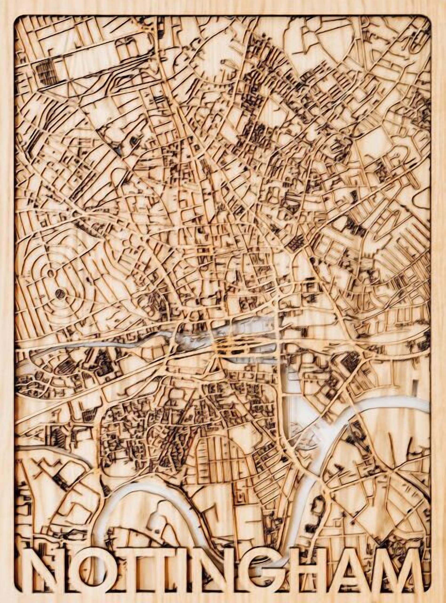 A detailed wooden cut-out map of Nottingham, highlighting the city's intricate street layout and prominent landmarks.