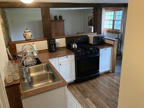 Microwave, oven, stovetop, cookware/dishes/utensils