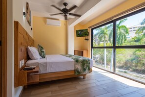 Deluxe Condo | 2 bedrooms, blackout drapes, iron/ironing board, free WiFi