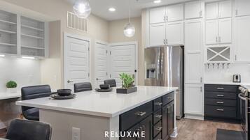 Coffee/tea maker, fridge, microwave, oven