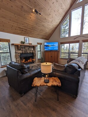 Smart TV, fireplace, foosball, books