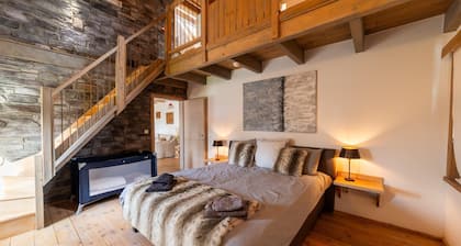 Maison de vacances avec bain Ă remous et sauna