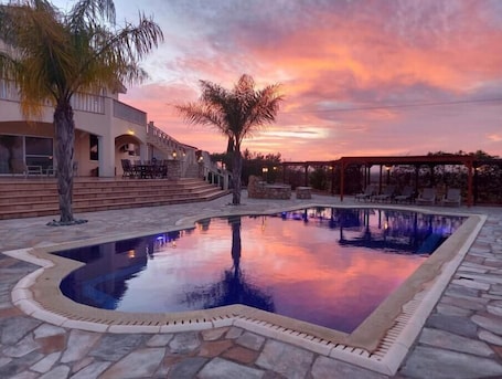 Outdoor pool. Hideaway Villa - quiet, spacious in unique landscaped gardens with golf green