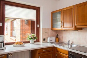 Réfrigérateur, four, plaque de cuisson, lave-vaisselle