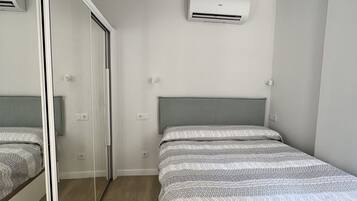 2 dormitorios, tabla de planchar con plancha, wifi y ropa de cama