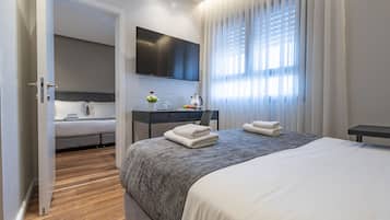 Minibar, cortinas opacas, wifi gratis y ropa de cama