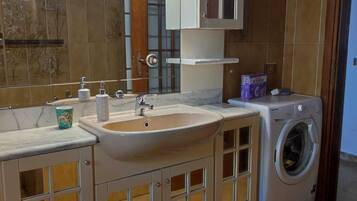 Hair dryer, bidet, towels, soap