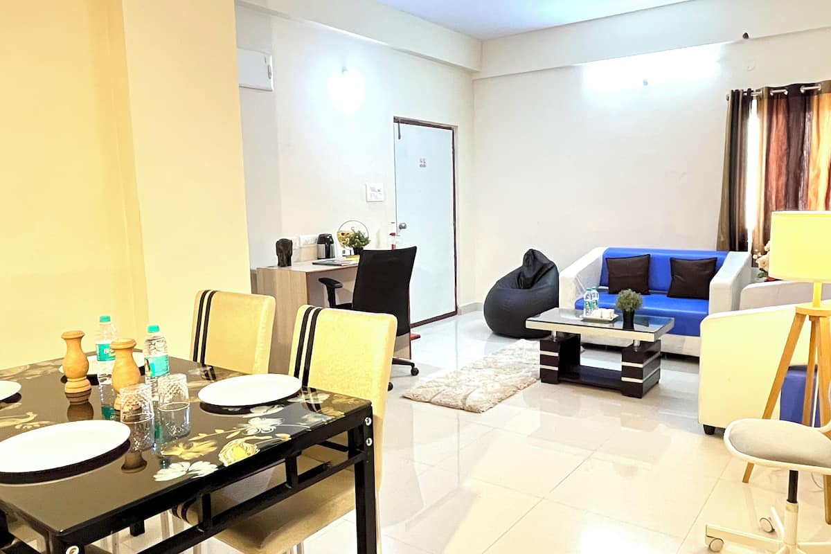 Appartement Confort | Aire de séjour | Téléviseur à écran plat