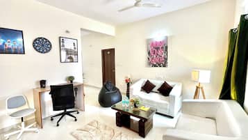 Comfort Apartment | Living area | Flat-screen TV