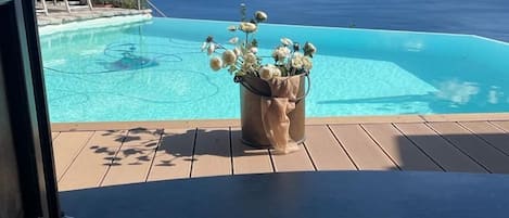 Seasonal outdoor pool, pool loungers