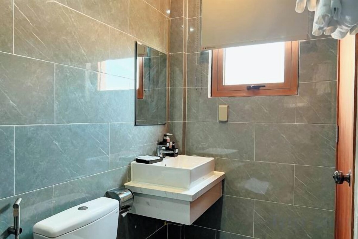 Bathroom | Shower, free toiletries, hair dryer, slippers