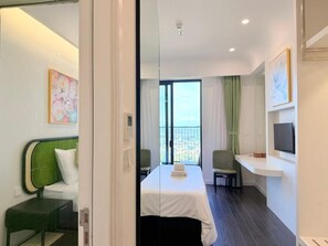 Family Studio Suite | Premium bedding, pillow-top beds, minibar, desk - Sea Sunset Hotel (Phu Quoc)