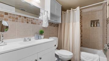 Hair dryer, towels, soap, shampoo