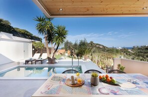 Outdoor dining - Olive Garden Cottage with Heated Pool (Platanias)